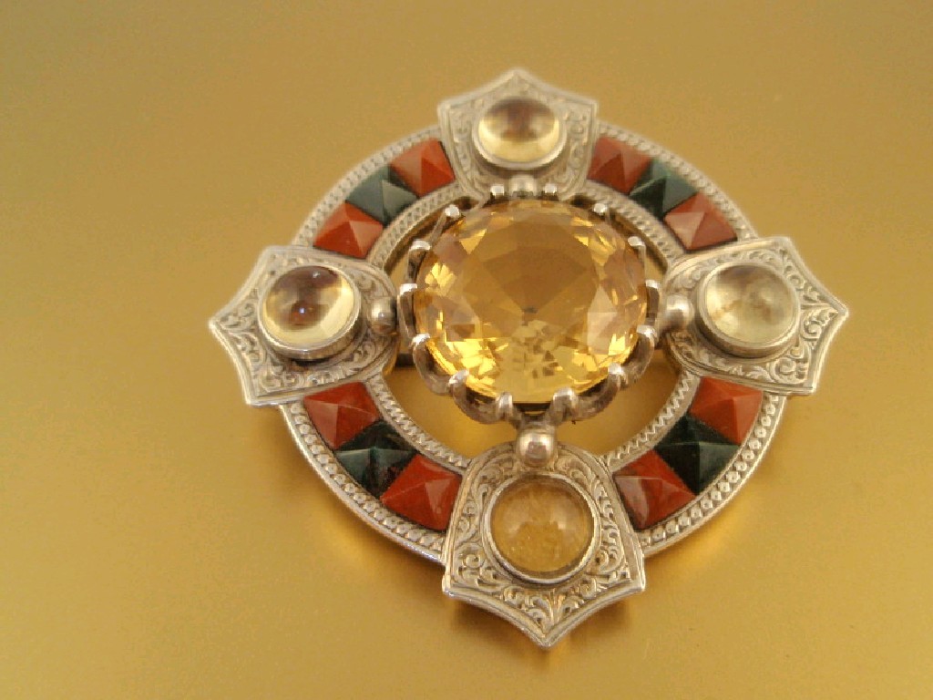 Appraisal: A Scottish circular shield brooch set with citrines and agates