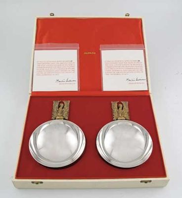 Appraisal: A cased pair modern limited edition parcelgilt nut dishes commissioned