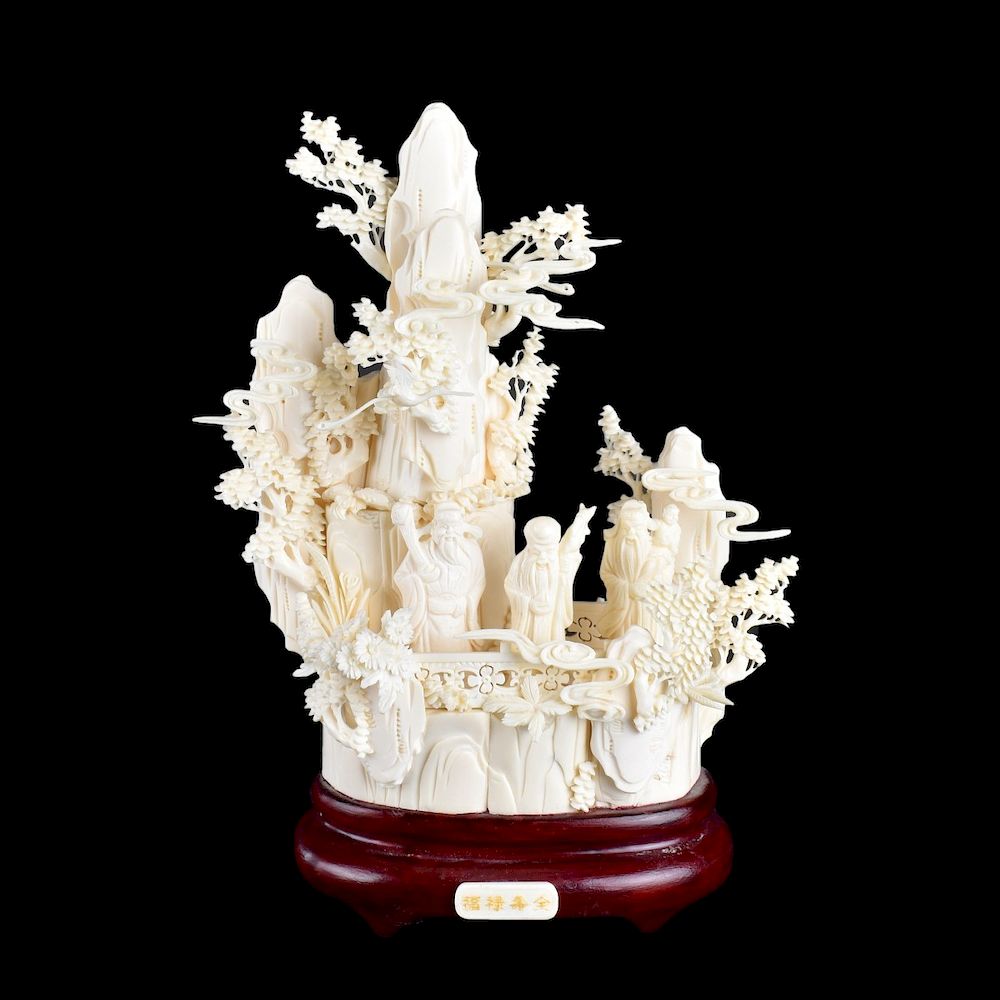 Appraisal: Decorative Faux Ivory Group Modern decorative faux ivory carved group