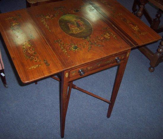 Appraisal: A satinwood painted and decorated two-flap Pembroke table the centre