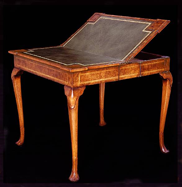 Appraisal: A George II style walnut games table The folding square