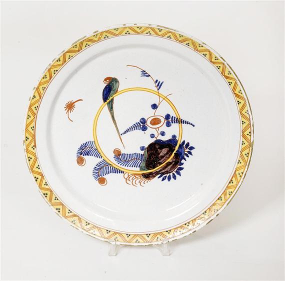 Appraisal: FAIENCE CHARGER DELFT TH CENTURY Polychrome painted with parrot with