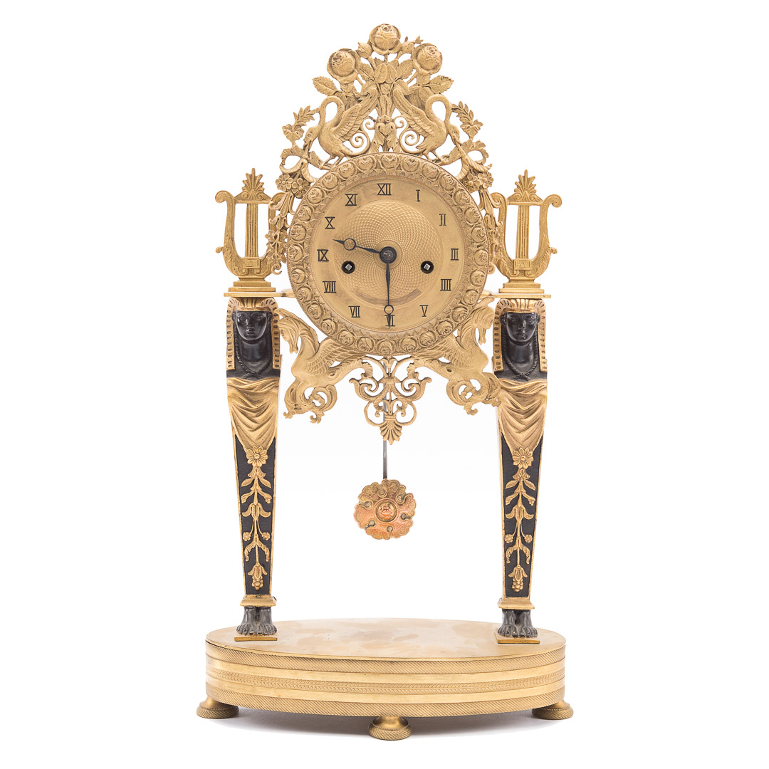 Appraisal: Napoleon III Egyptian Revival portico clock circa gilt metal drum