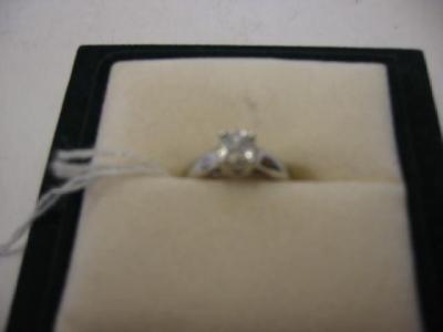 Appraisal: A SOLITAIRE DIAMOND RING the pie cut stone of approximately