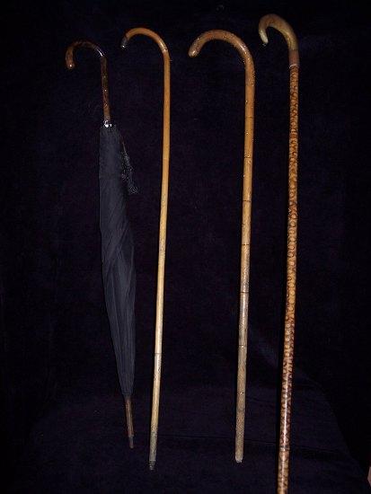 Appraisal: A bamboo cane with silver mounts maker's mark E A