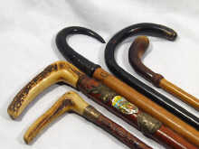 Appraisal: Five walking sticks comprising four with horn handles and one