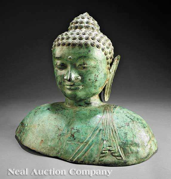 Appraisal: A Southeast Asian Patinated Brass Bust of a Bodhisattva th