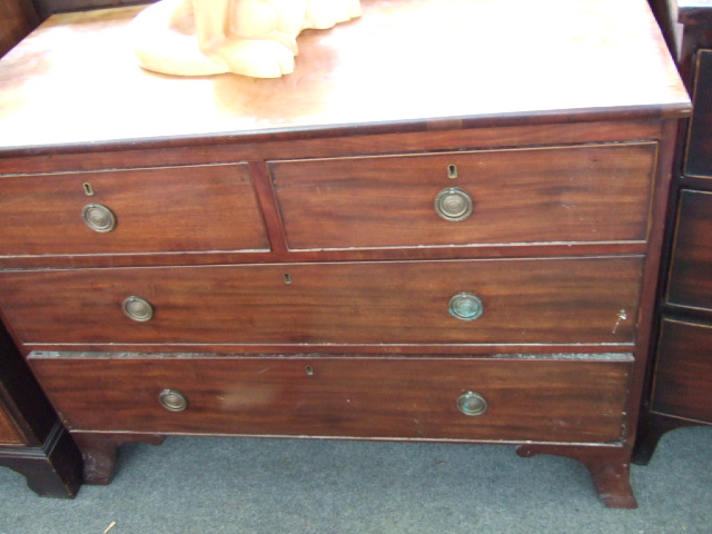 Appraisal: A George III mahogany chest with two short over two