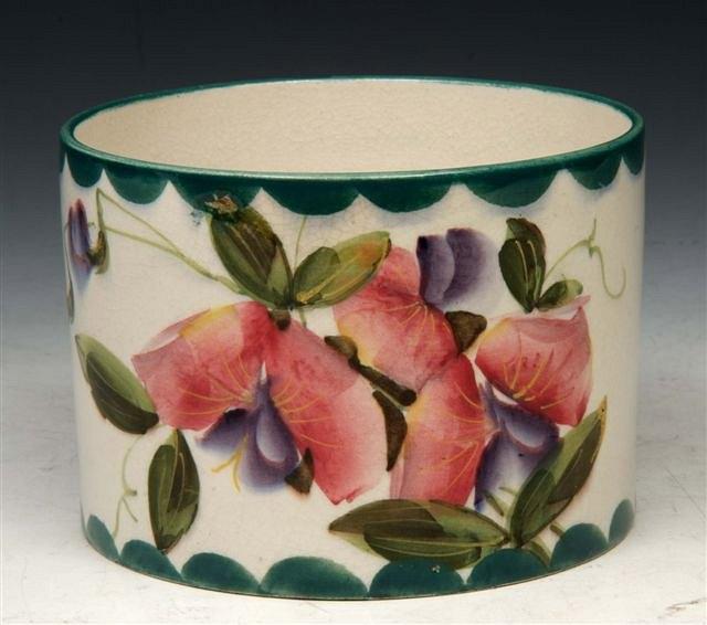 Appraisal: A WEMYSS POT decorated with sweet pea decoration with printed