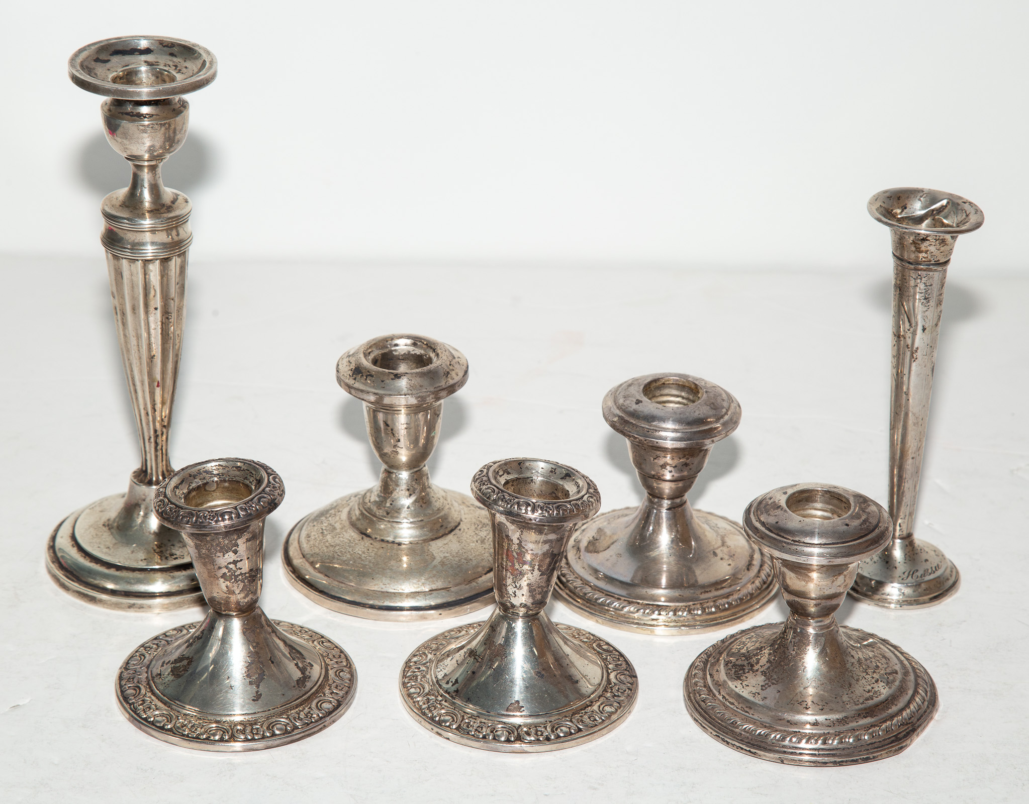 Appraisal: COLLECTION OF WEIGHTED STERLING SILVER Including five low candlesticks one