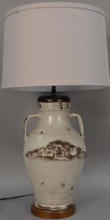 Appraisal: Stoneware jug made into a table lamp with applied decoration