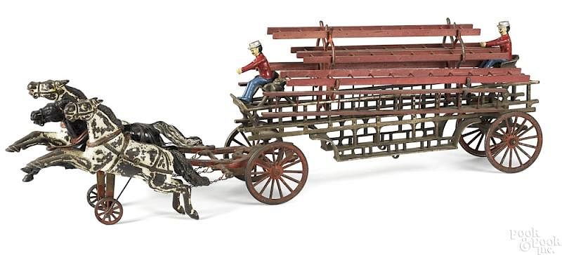 Appraisal: Kenton oversized cast iron horse drawn ladder wago Kenton oversized