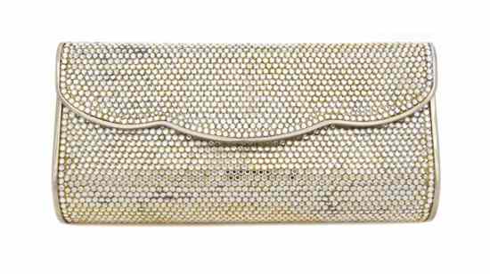 Appraisal: A Judith Leiber Champagne Crystal Hardsided Clutch lined in silver