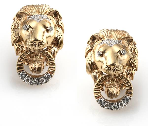 Appraisal: A pair of diamond and k gold lion motif doorknocker