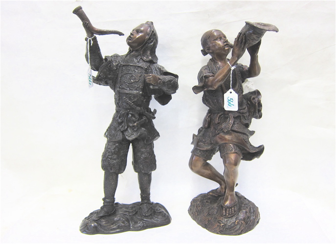 Appraisal: TWO BRONZE SAMURAI SCULPTURES Samurai blowing a buffalo horn H