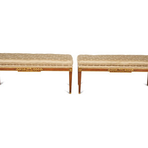 Appraisal: A Pair of Empire Style Parcel Gilt Mahogany Benches with