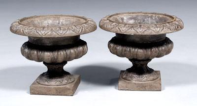 Appraisal: Pair cast iron garden urns each typical form with decorated