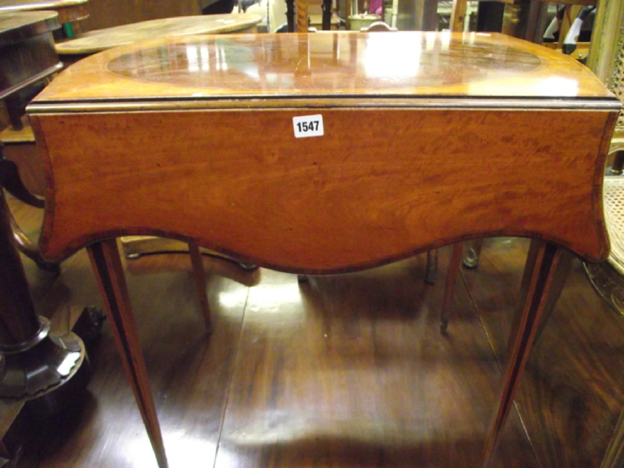 Appraisal: A good quality th century mahogany and satin wood Pembroke