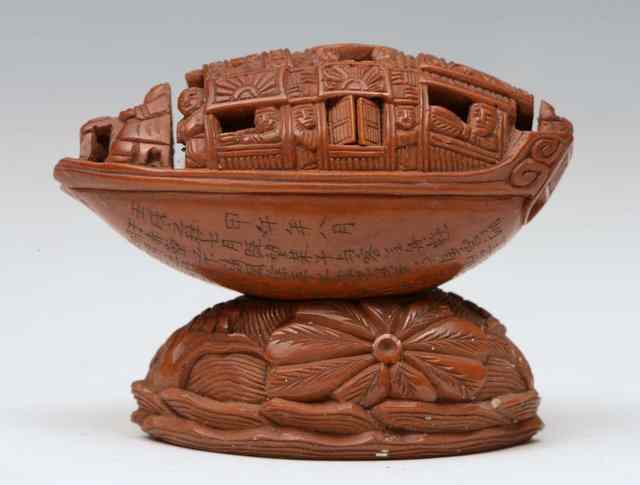 Appraisal: A CHINESE COQUILLA NUT CARVING OF A MODEL JUNK with