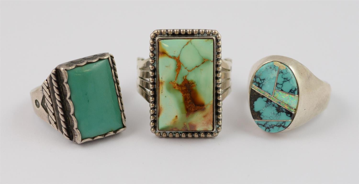 Appraisal: Navajo sterling mens rings with stampwork turquoise cabochon one turquoise