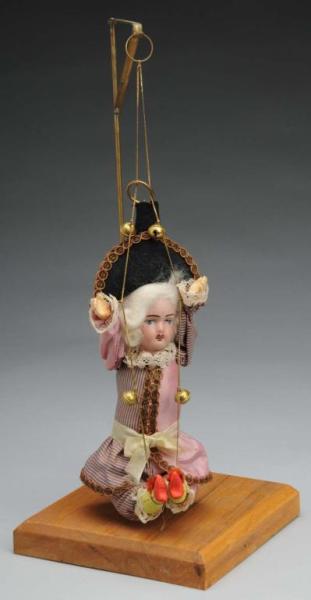 Appraisal: French-style Polichinelle Marionette Description Unknown age French bisque head with