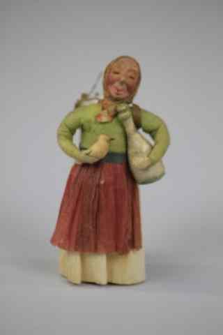 Appraisal: FRENCH PEASANT GIRL CANDY CONTAINER Germany French peasant girl composition