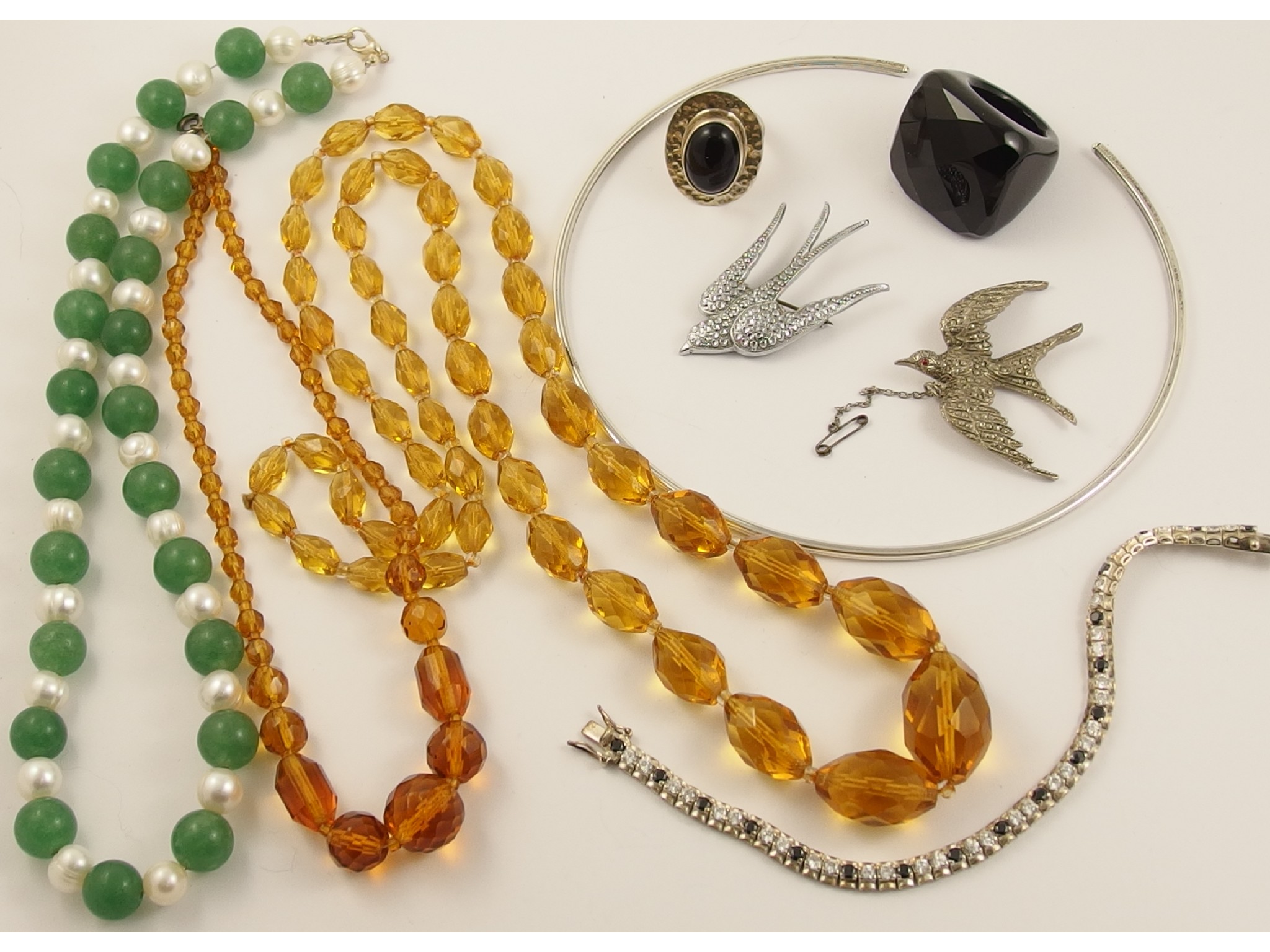 Appraisal: A collection of silver and costume jewellery to include a