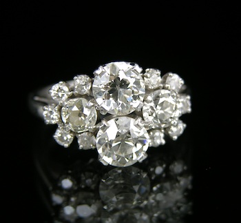 Appraisal: A Vintage Ladies' Diamond Cluster Ring in Platinum Platinum mounting