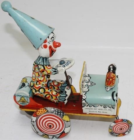 Appraisal: UNIQUE ART TIN LITHOGRAPH WIND-UP ARTIE THE CLOWNCAR WORKING CONDITION