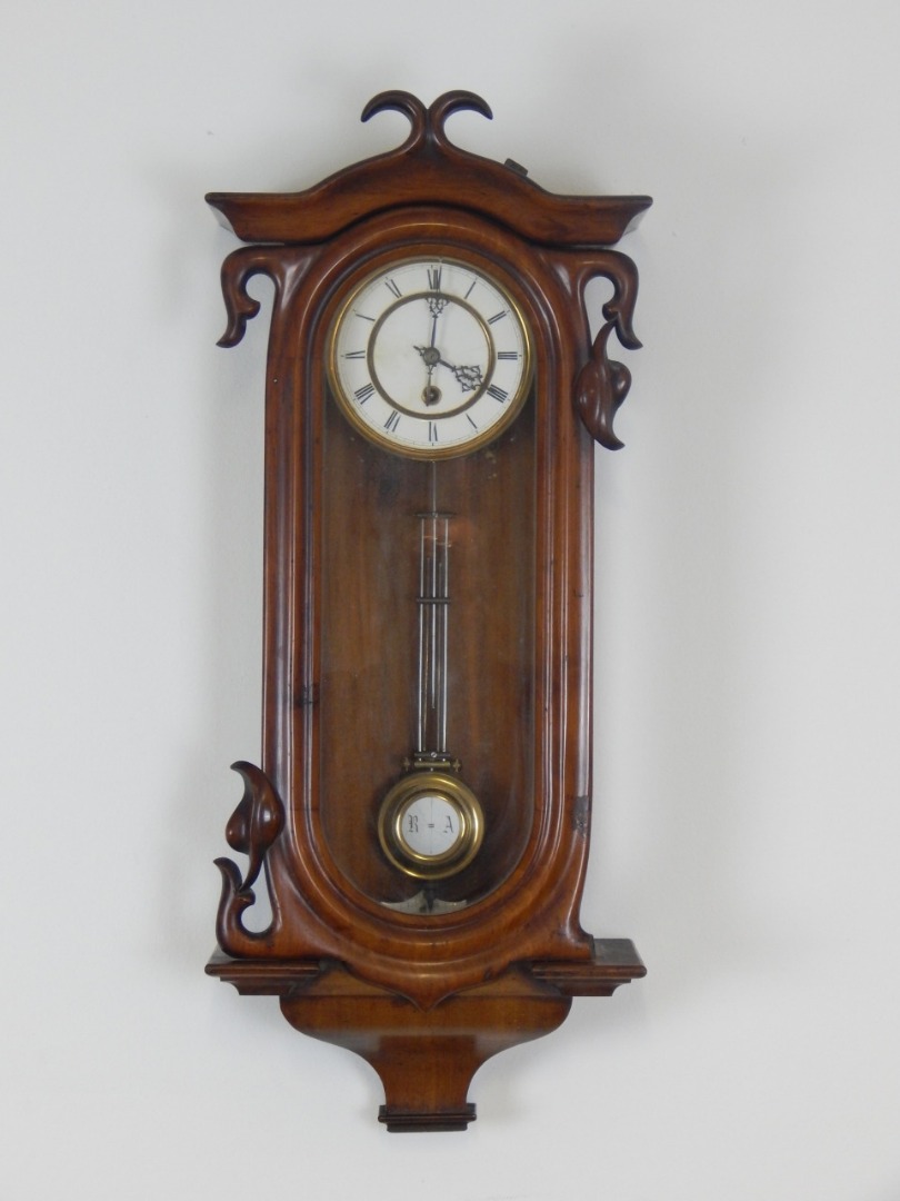 Appraisal: A late thC Continental walnut wall clock in Art Nouveau