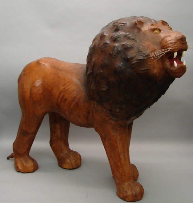 Appraisal: Standing lion features full leather body and tail glass eyes