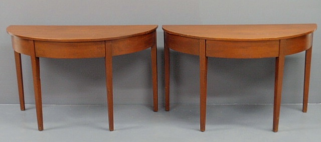 Appraisal: Two pine with cherry stain D-shaped end tables h x