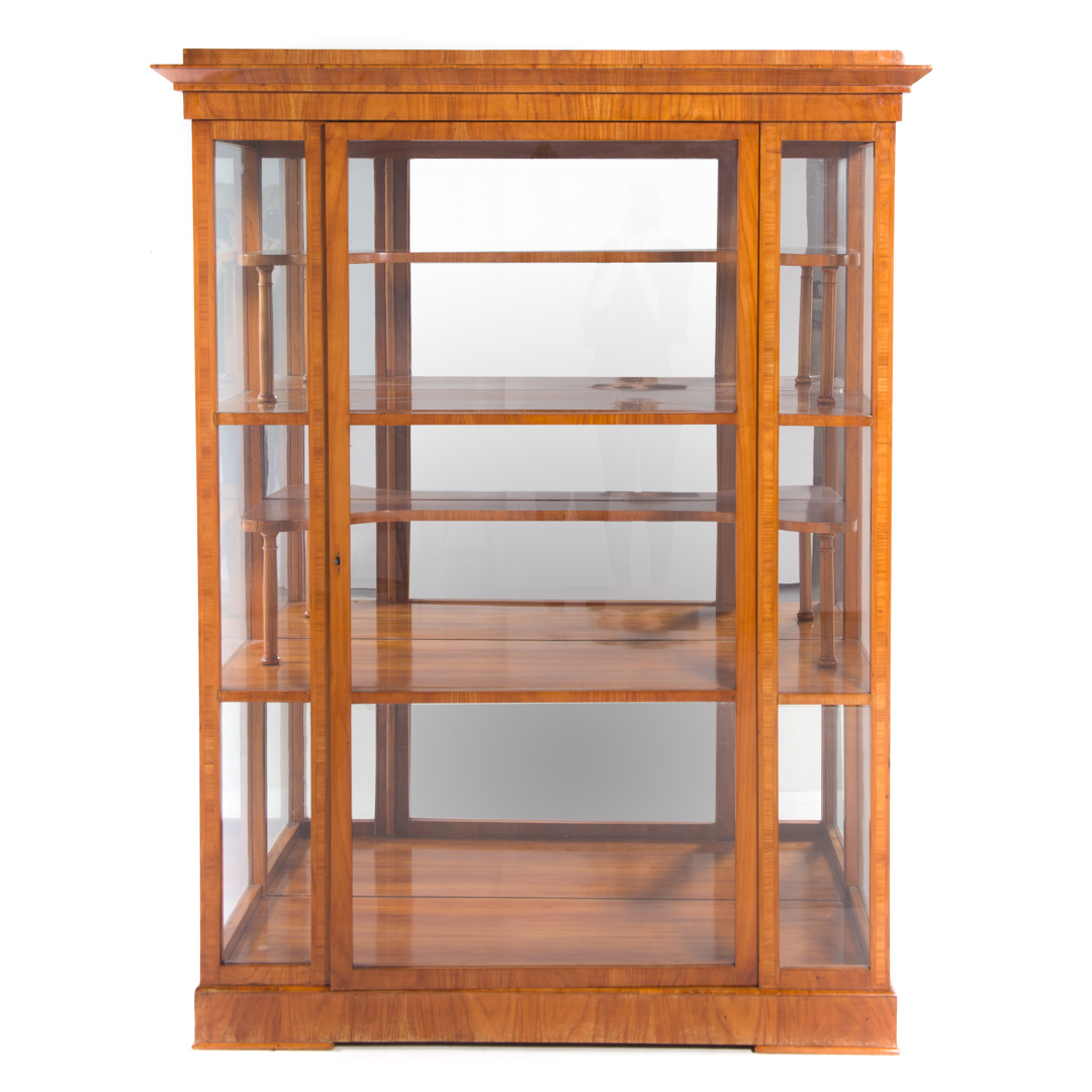 Appraisal: Biedermeier cherrywood veneer vitrine In the manner of Josef Danhauser