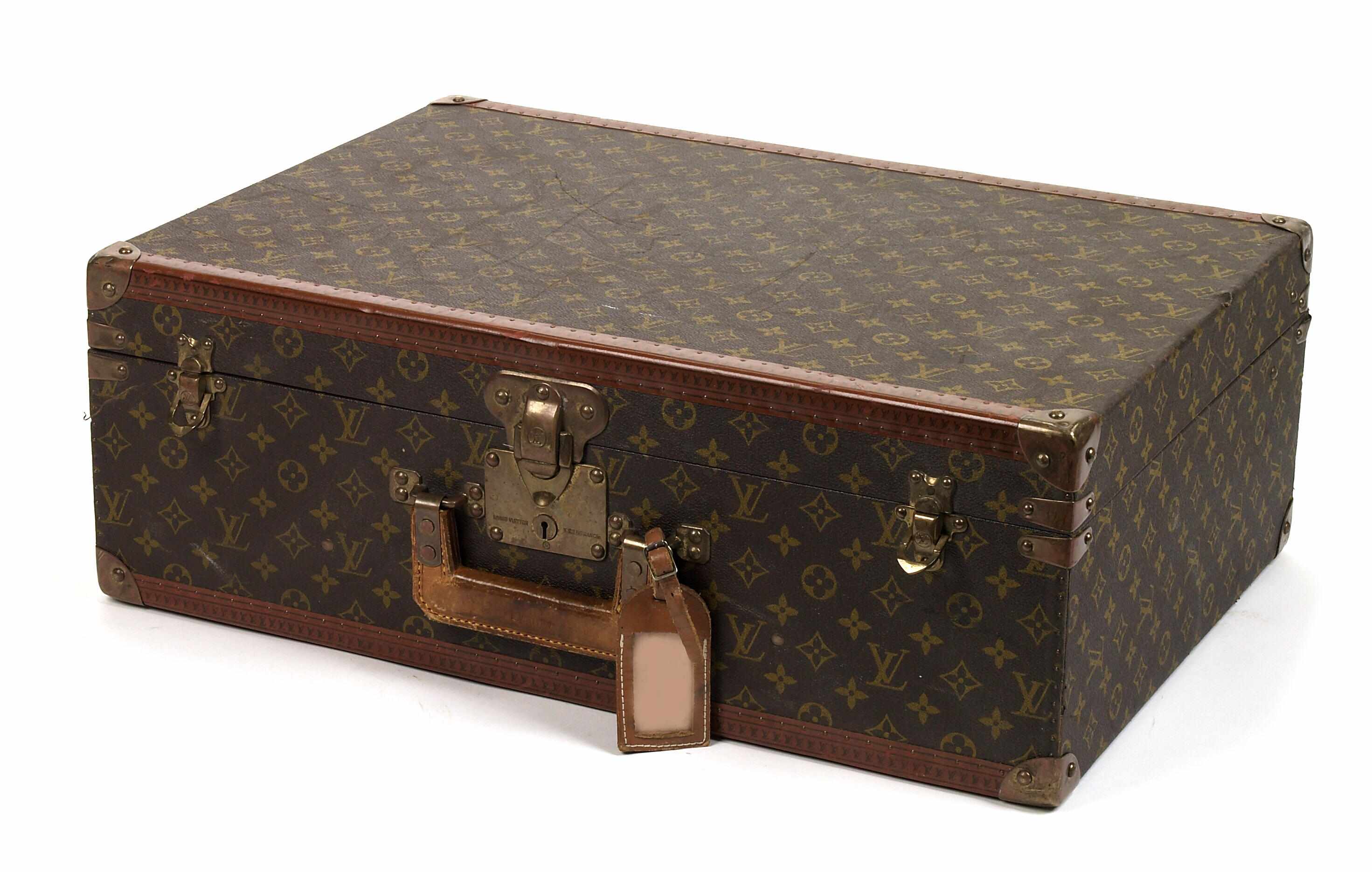 Appraisal: A Louis Vuitton hard case suitcase Serial Number inscribed to