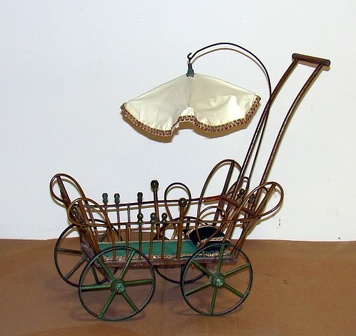 Appraisal: Doll carriage Green and natural bent willow style with hanging