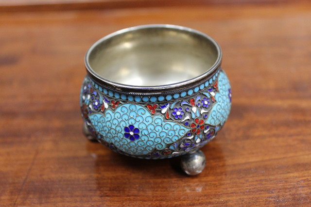 Appraisal: A RUSSIAN POLYCHROME ENAMEL AND SILVER SALT on three spherical