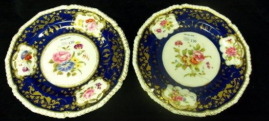 Appraisal: Two Derby plates decorated floral cartouches within a blue border