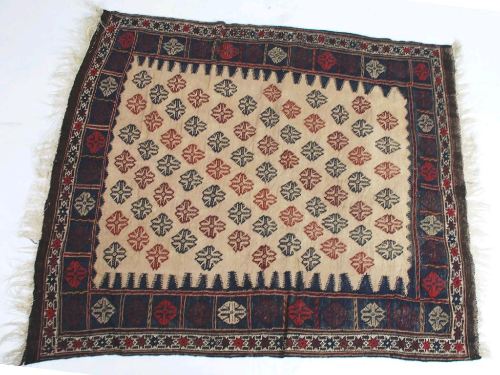 Appraisal: EASTERN KELIM RUG with all-over crimson and black floret pattern