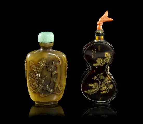 Appraisal: A Carved Horn and Tortoise Shell Snuff Bottle relief carved