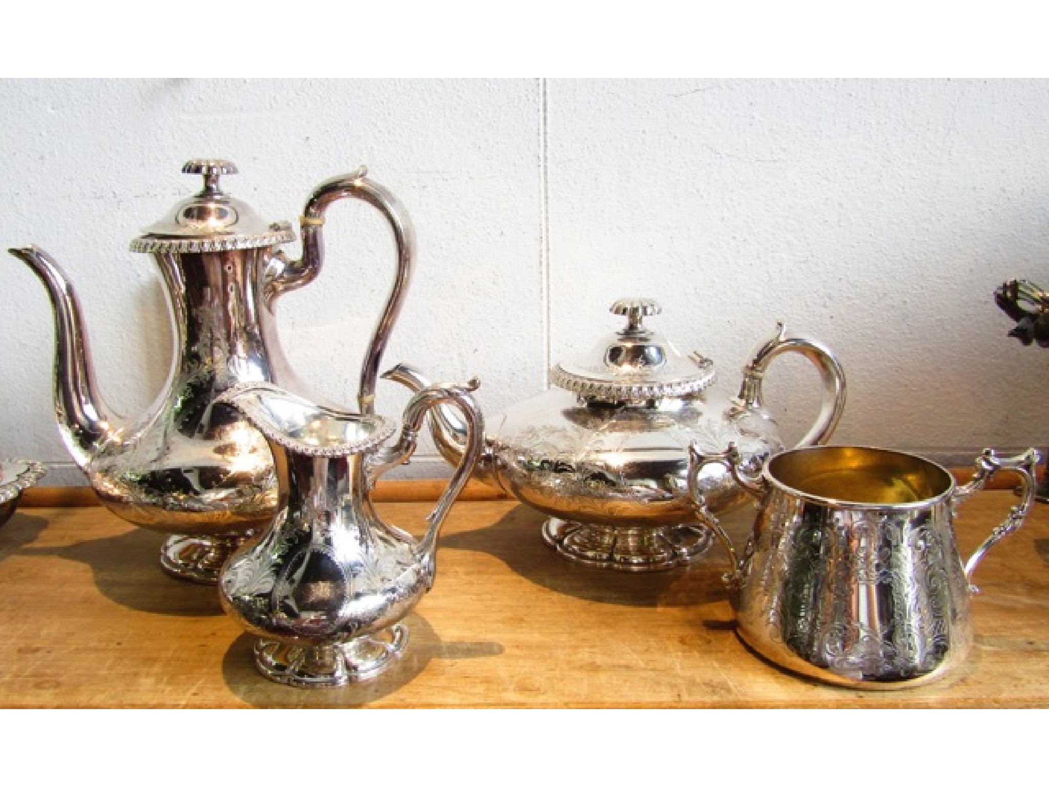 Appraisal: A three piece silver plated tea set by Elkington Company