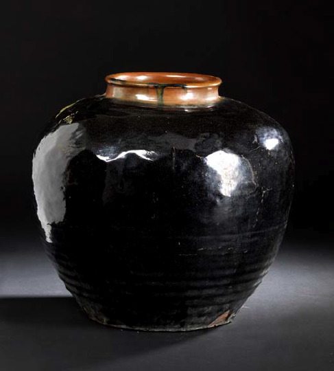 Appraisal: Large Provincial Mirror-Black-Glazed Squat Pyriform Pottery Storage Jar of the