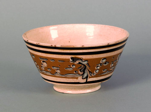 Appraisal: Mocha waste bowl th c with marbleized decoration on a