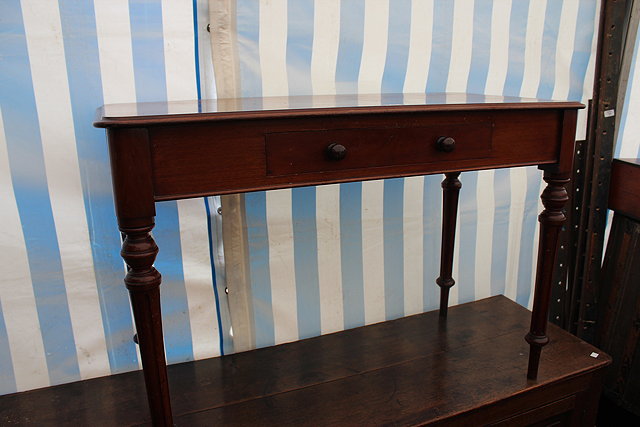 Appraisal: AN EARLY VICTORIAN MAHOGANY RECTANGULAR SIDE TABLE fitted with one