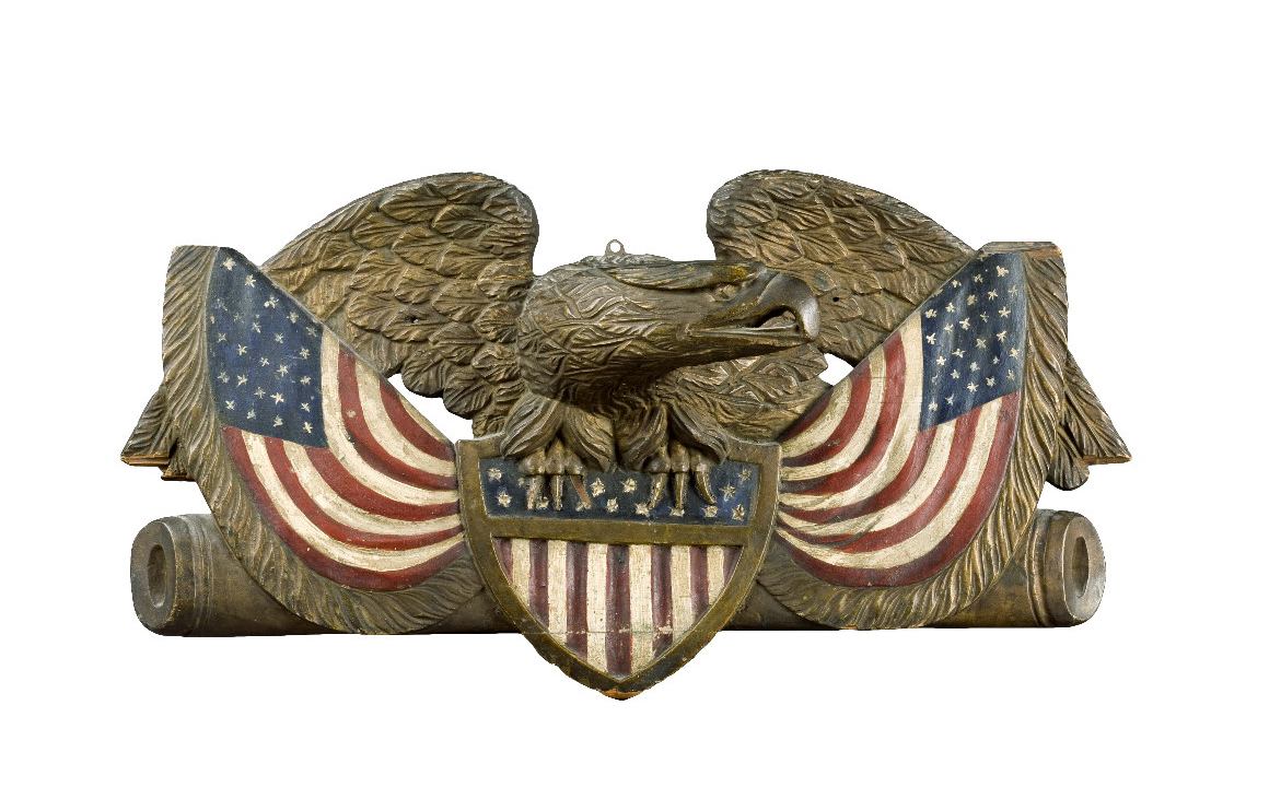 Appraisal: CARVED AND POLYCHROMED EAGLE CLUTCHING AN AMERICAN SHIELD WITH BANNERS