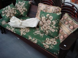 Appraisal: A convertible divan bed in green upholstery