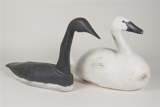 Appraisal: Two Hand Carved Decoys Swan with painted eyes crackling and