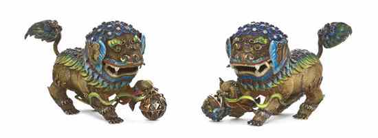 Appraisal: A Pair of Chinese Silvered Wirework and Enamel Fu Dogs