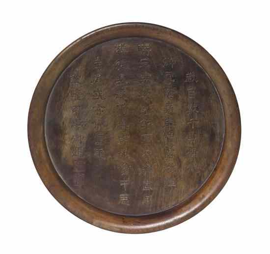 Appraisal: A Chinese Hardwood Tray of circular form having calligraphic inscription