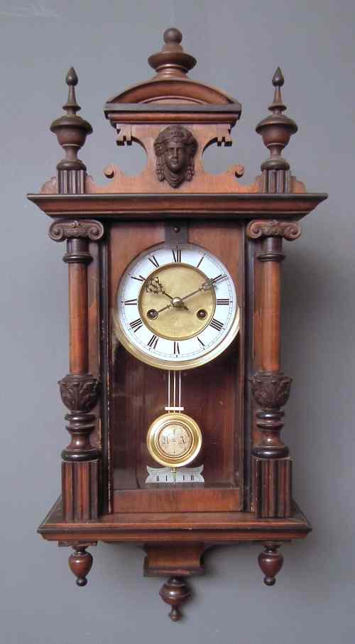 Appraisal: A late th early th Century Continental walnut cased ''Vienna