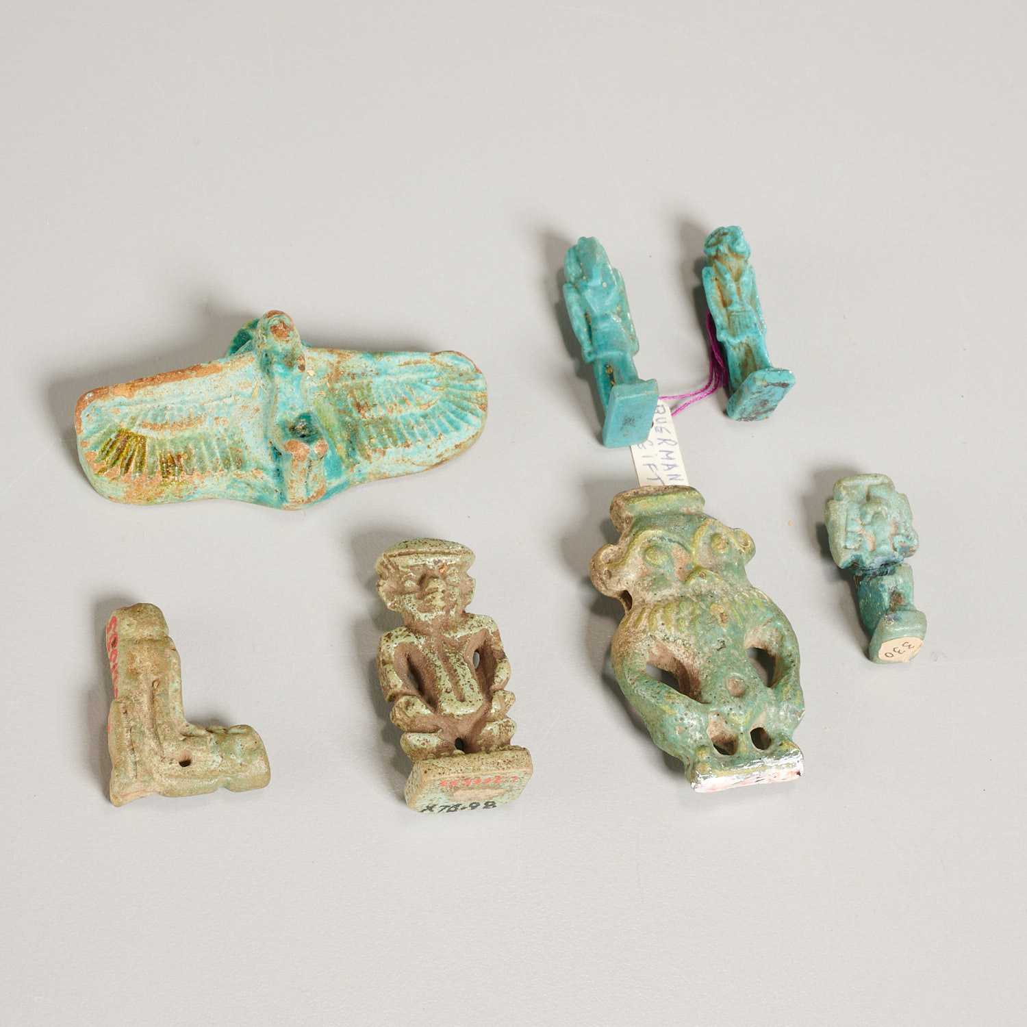 Appraisal: ANCIENT EGYPTIAN AMULETS EX-MUSEUM Possibly c BCE incl faience clay